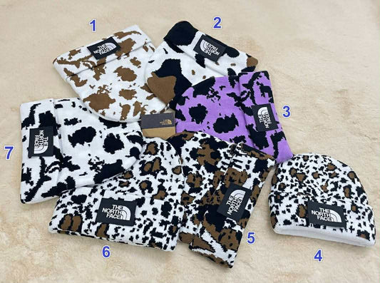 NF Cow Print Hats